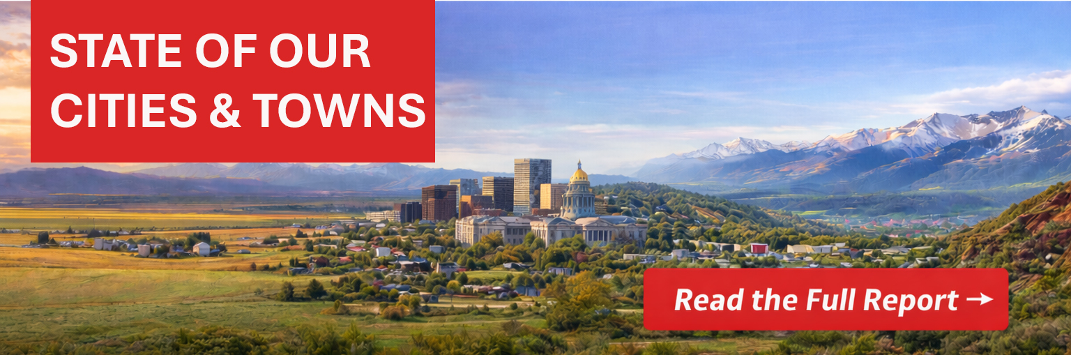 Panoramic banner showing Colorado’s Eastern Plains farmland transitioning into a mid-sized city skyline and small rural neighborhoods, with the Rocky Mountains in the background and a red “Read the Full Report” button in the lower right.